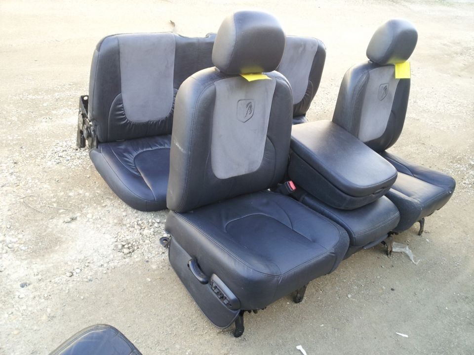 02 05 DODGE RAM BLACK LEATHER /SUADE SEATS DUAL POWERED SEAT FRONT 40 