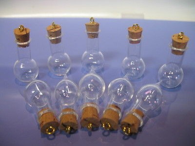 Mixed lot of 2 types of bottles.10 miniature glass vials with cork 
