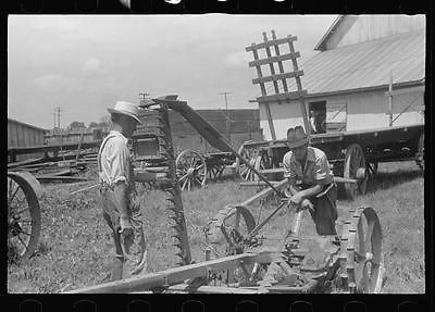 Inspecting farm machinery at public auction in central Ohio