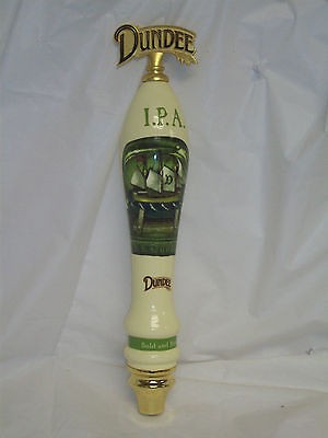 Dundee Porcelain I.P.A. Beer Tap Handle Ship In Bottle on Book 