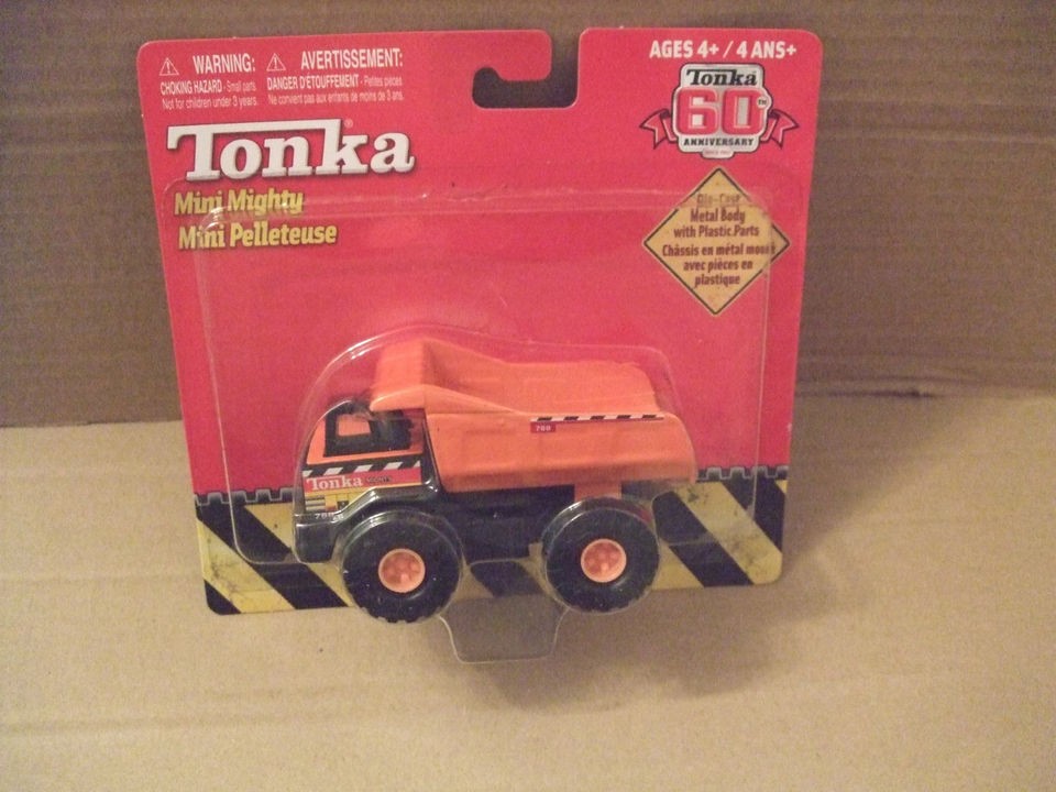 Tonka 60 th anniversary no 768 Orange Mighty Dump Truck 4 inches long 