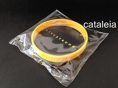 NEW NIKE LIVESTRONG CANCER YELLOW BRACELET WRISTBAND RUBERBAND XS M