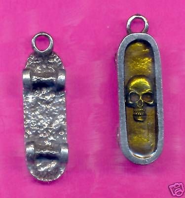 wholesale pewter skateboard skull pendants 7089 