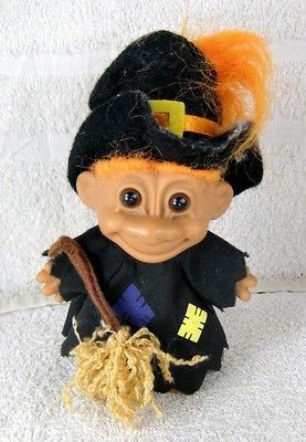 mini troll doll figure dressed as a halloween witch time