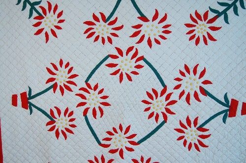 This GORGEOUS cotton 30s poinsettia quilt is hand appliqued and hand 