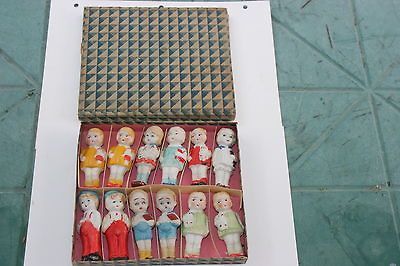 SET OF TWELVE FROZEN CHARLOTTE BISQUE DOLLS IN ORIGINAL BOX