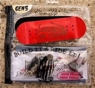 Red Laser Cut Closeup Fingerboard GEN5 Skull Hand Mini Skateboard 