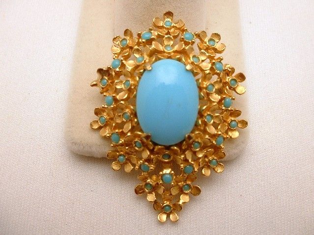 description this is a beautiful denicola brooch the center stone is