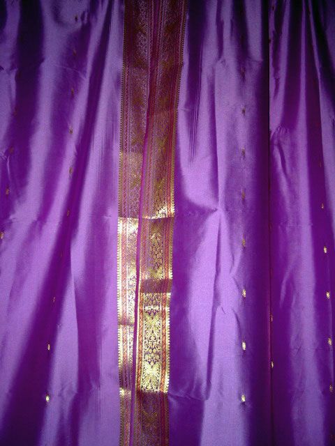  window curtains with golden floral border certainly make an elegant