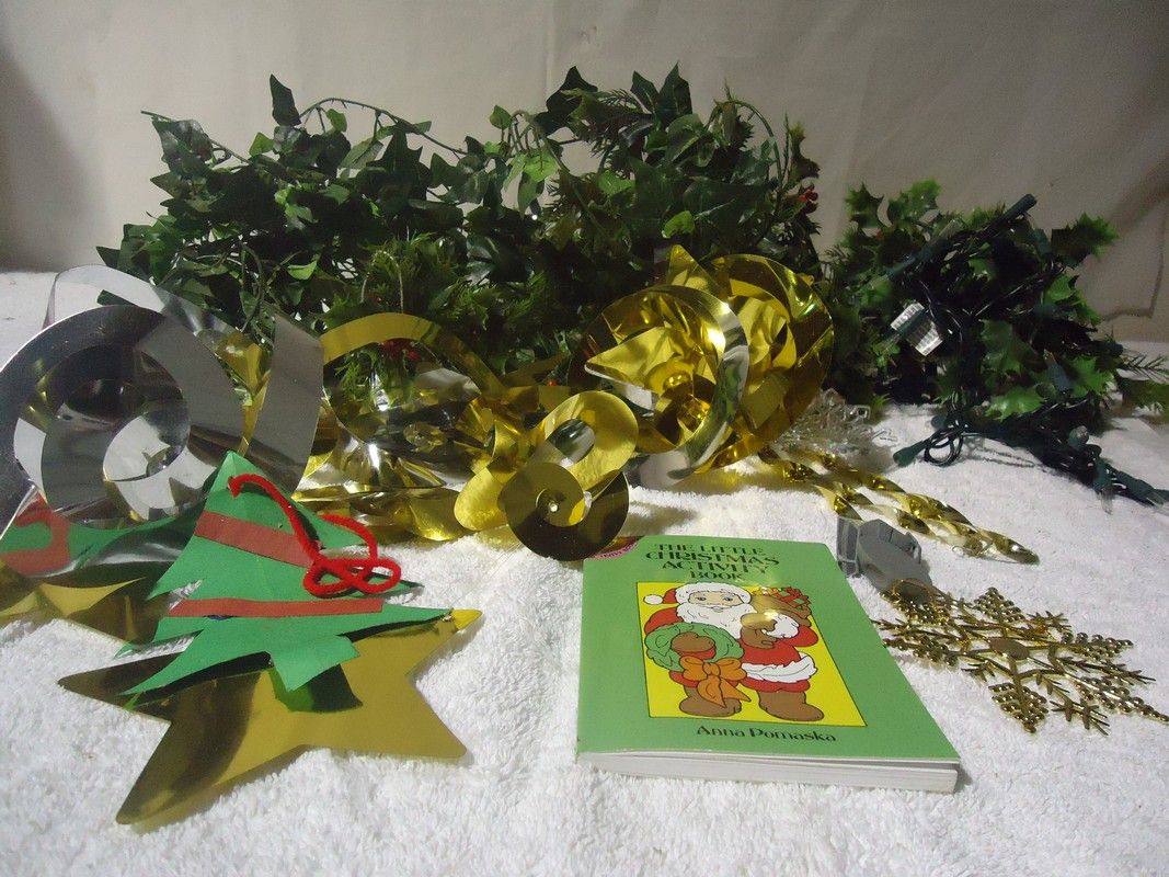 Mixture of Christmas items and activities including ornaments, C