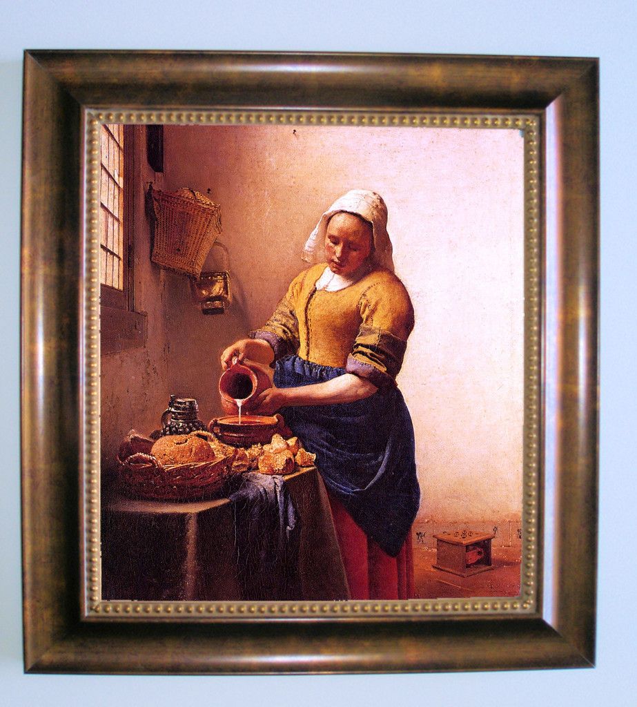 Art Reproduction on canvas of The Milkmaid by Johannes Vermeer.