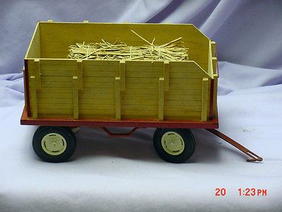 WOODEN FARM WAGON ON METAL RUNNING GEAR, 1/16 SCALE