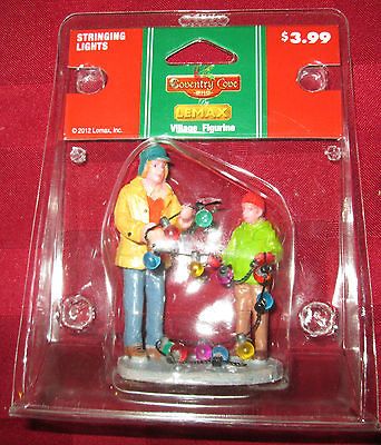 Lemax Coventry Cove Stringing Lights Village Figurine NIP 2012