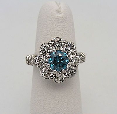 14k White Gold Flower Ring with 1 Rd Blue Dia. 1.02 ct. and 18 rbr